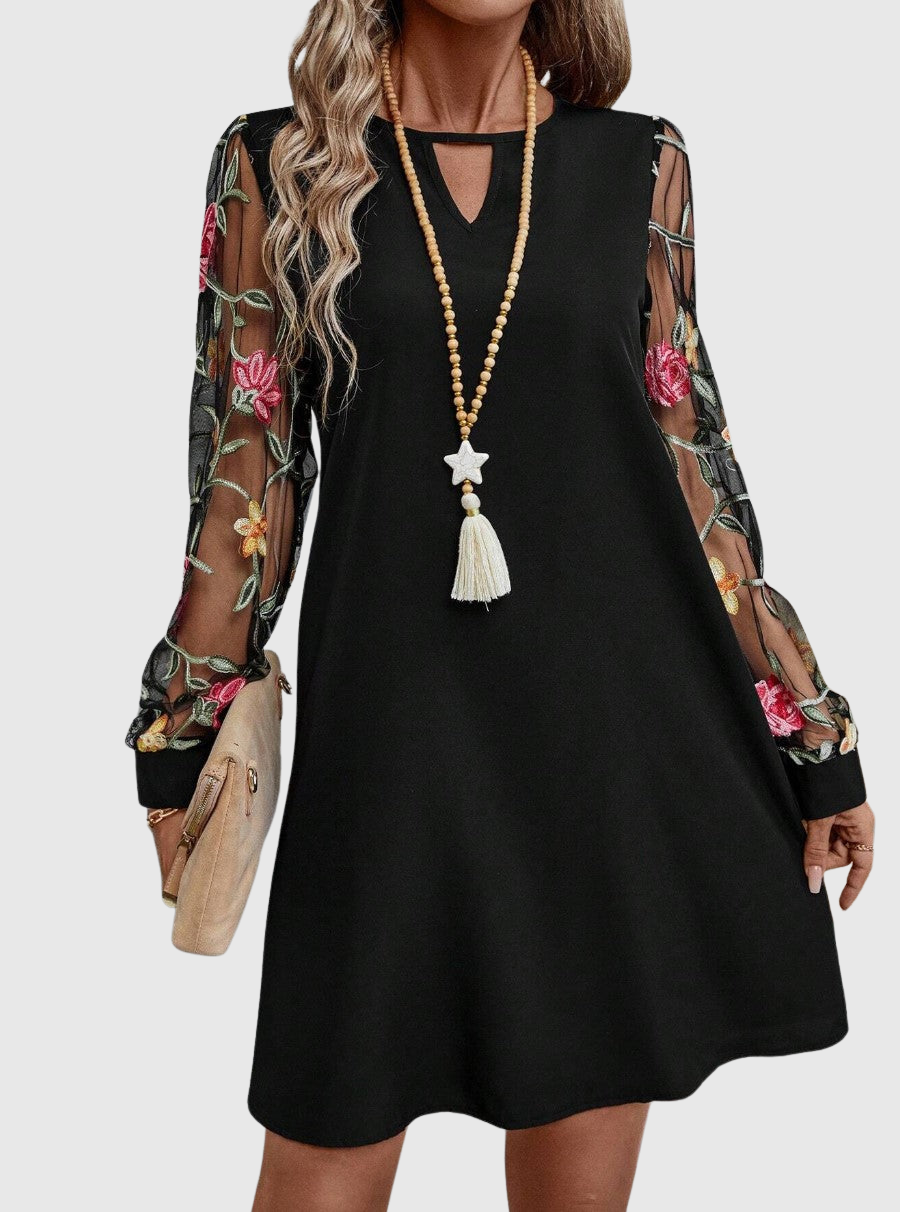 Jolanta | Elegant dress with a V-shaped neckline and bold sleeves