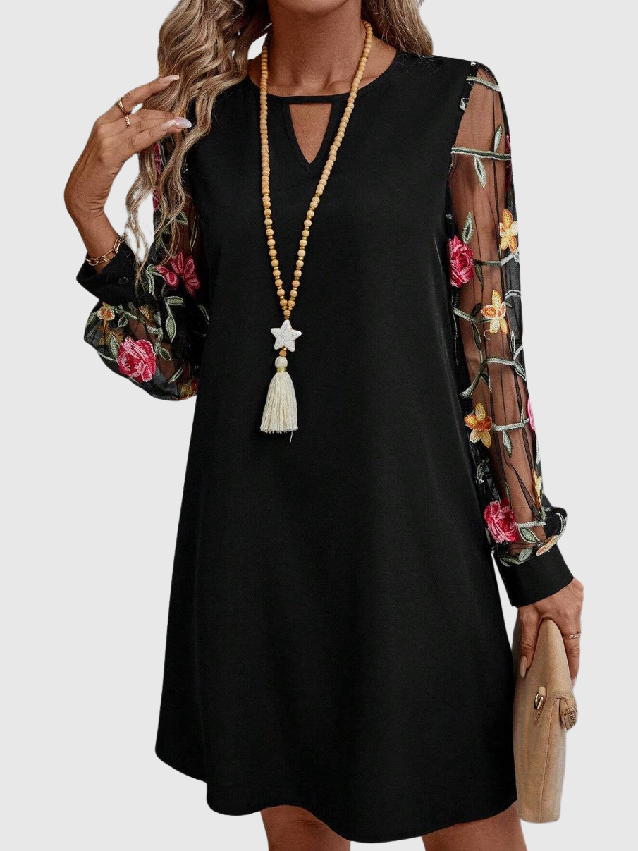 Jolanta | Elegant dress with a V-shaped neckline and bold sleeves