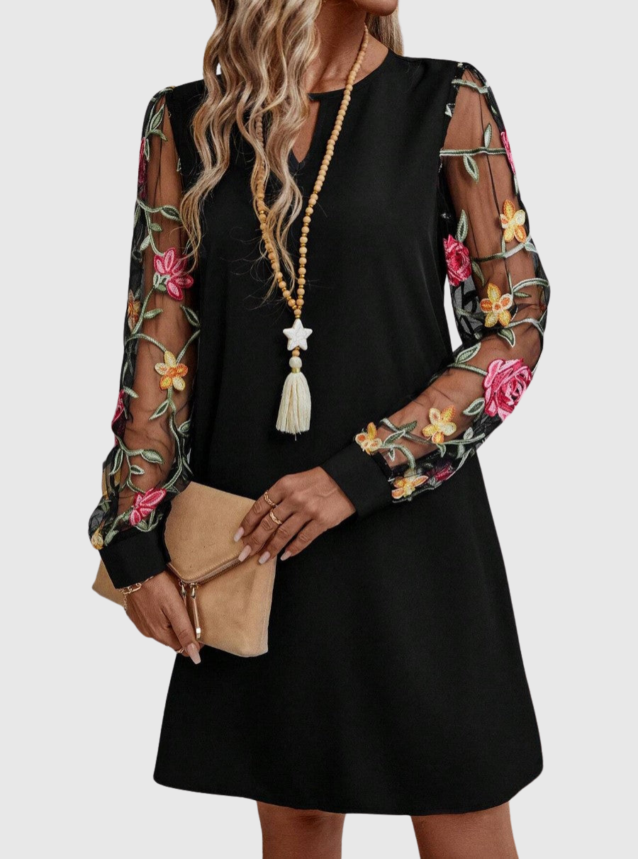 Jolanta | Elegant dress with a V-shaped neckline and bold sleeves