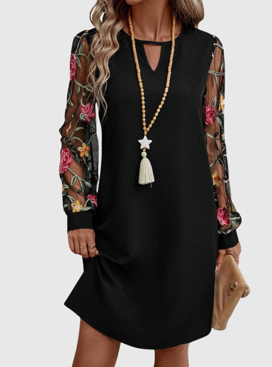 Jolanta | Elegant dress with a V-shaped neckline and bold sleeves